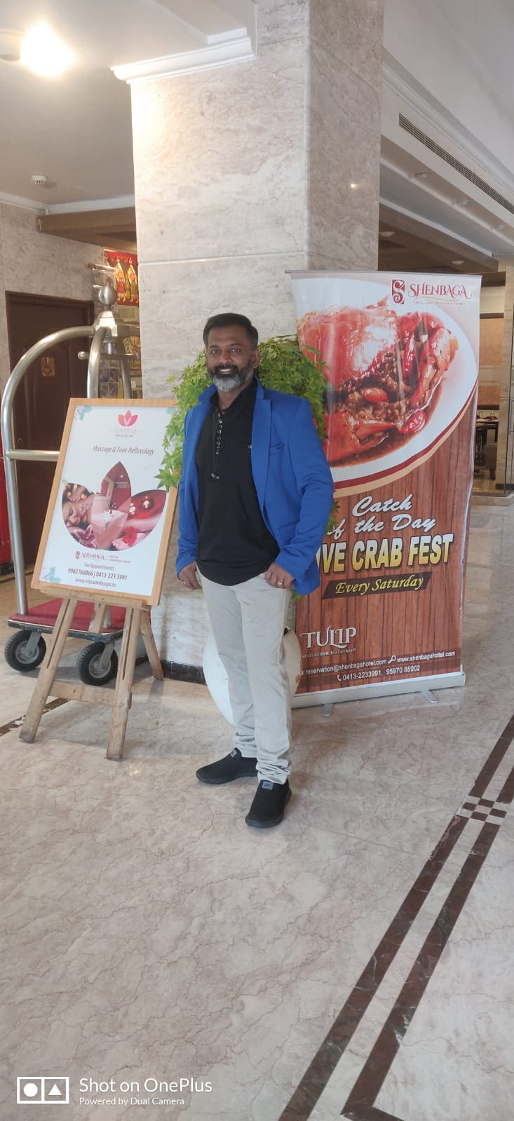 Blue blazer, big smile